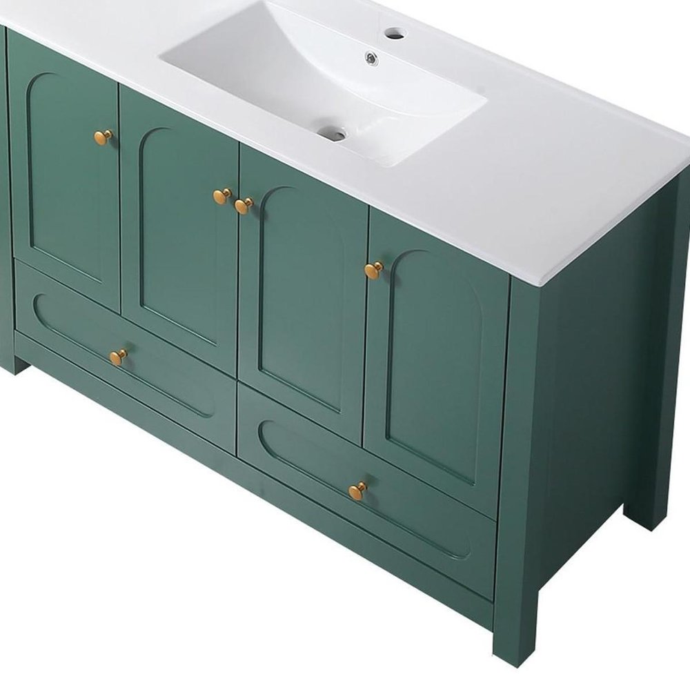 48" Green Wood Freestanding Four Door Bathroom Vanity With White Sink And Two Drawers. Bathroom vanity isolated on a plain white background, in a white wood finish.
